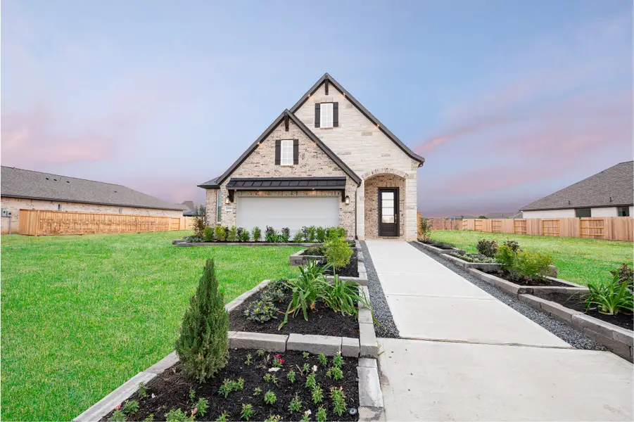 Front exterior of a home in the Ellwood: Prestige Collection community, located in Iowa Colony, TX (Image 5).
