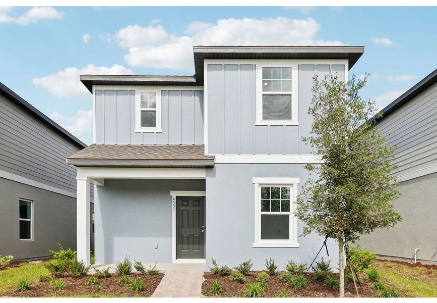 Front exterior of a home in the Hawks Run community, located in Kissimmee, FL (Image 3).