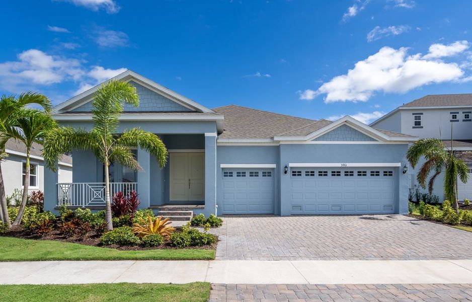 Front exterior of a home in the Marisol Pointe at MiraBay Signature Series community, located in Apollo Beach, FL (Image 5).