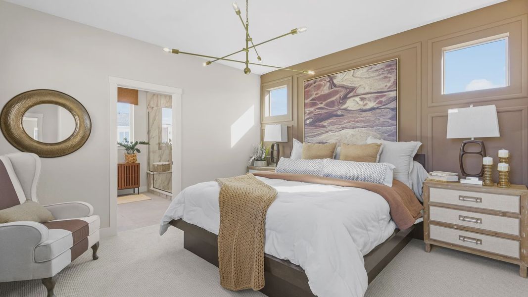 Modern chandelier, plush textures, and striking artwork enhance this Dillon Pointe bedroom's refined elegance. Modern chandelier, plush textures, and striking artwork enhance this Dillon Pointe bedroom's refined elegance.