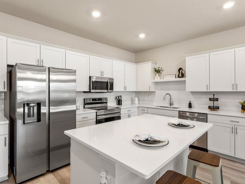 Available design packages offer timeless white finishes - Flora townhome model in St. Cloud, FL