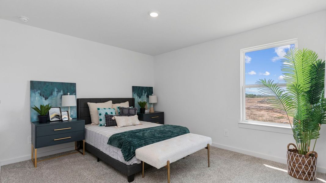 Furnished interior in a model home at August Trails in Needville (Image 10).