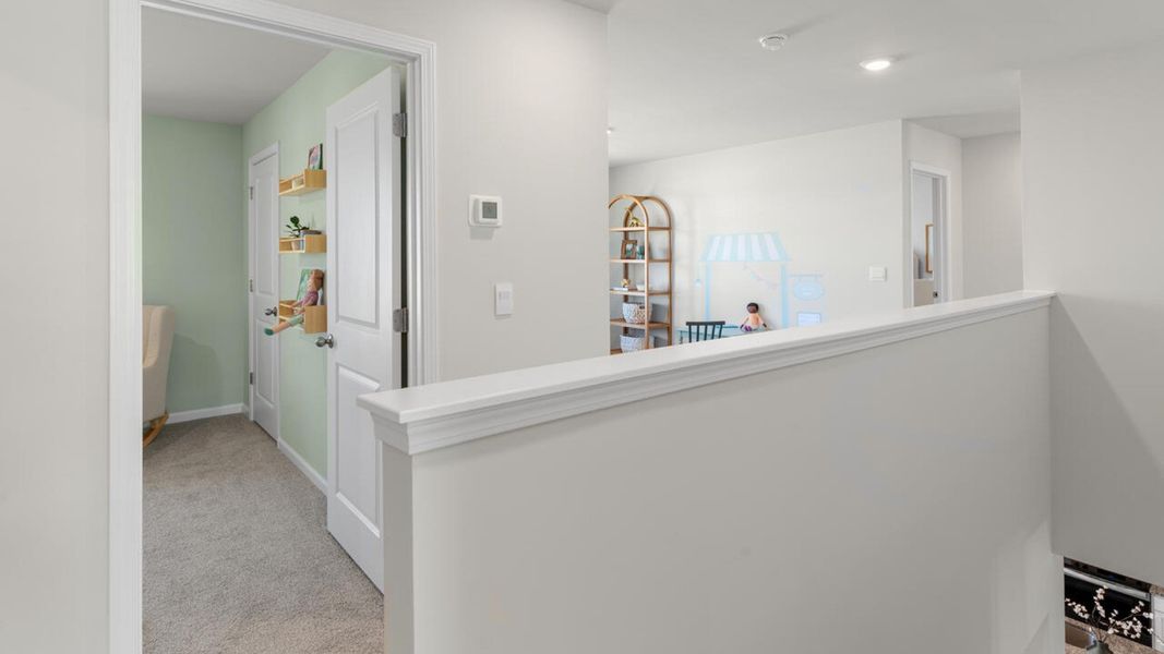 Furnished interior in a model home at The Grove at Blake Farm in Wilmington (Image 24). Furnished interior in a model home at The Grove at Blake Farm in Wilmington (Image 24).