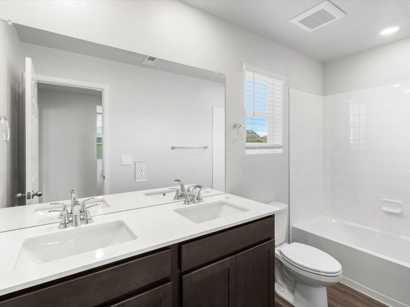 Furnished interior in a model home at Frontier Estates - The Flora Collection in Firestone (Image 19).