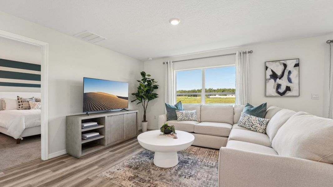 Furnished interior in a model home at Sunset Hills in Summerfield (Image 10).
