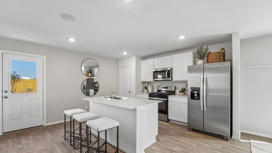 Furnished interior in a model home at Marigold in Kyle (Image 9).