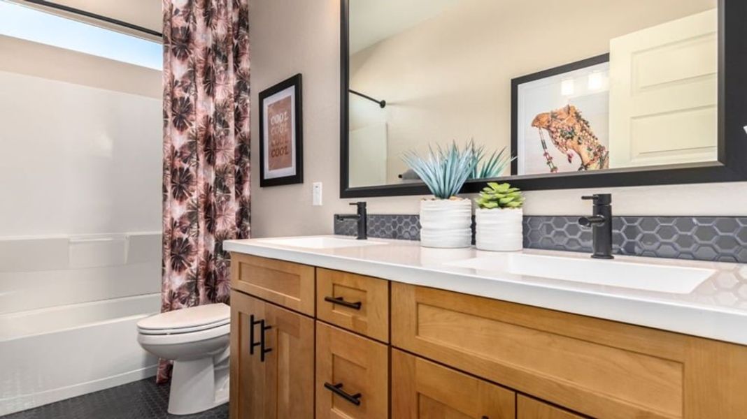 Furnished interior in a model home at Alamar Encore Collection in Avondale (Image 29).