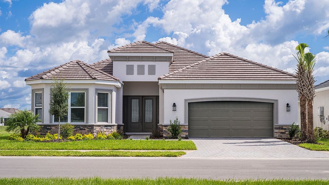 Front exterior of a home in the Esplanade Lake Club community, located in Fort Myers, FL (Image 37).