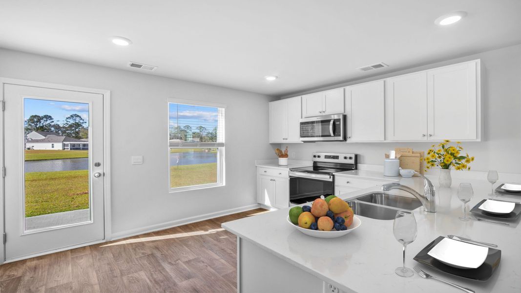 Furnished interior in a model home at Longleaf Village in Rincon (Image 29).