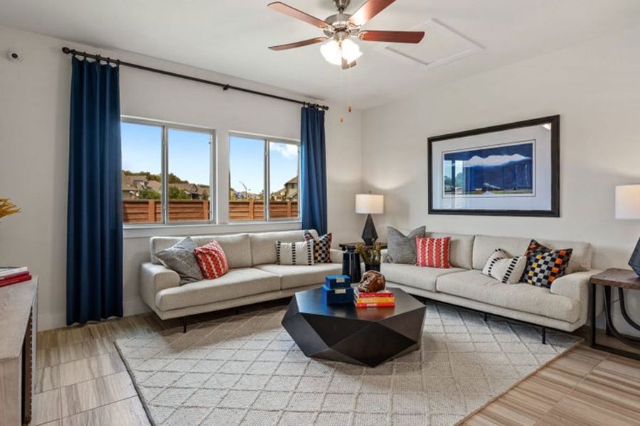 Furnished interior in a model home at Saddle Creek Twinhomes in Georgetown (Image 28).