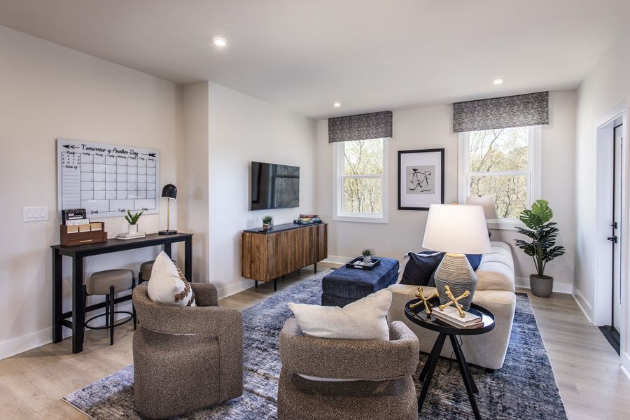 Furnished interior in a model home at Estates at Daves Creek in Cumming (Image 18).