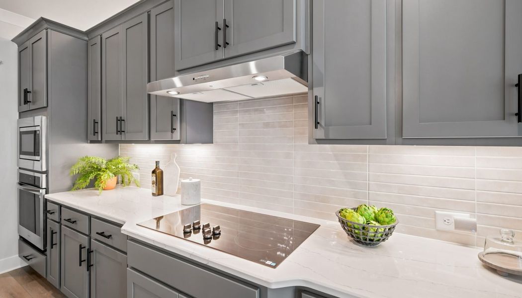 Furnished interior in a model home at Fowler Farms in Auburn (Image 74).