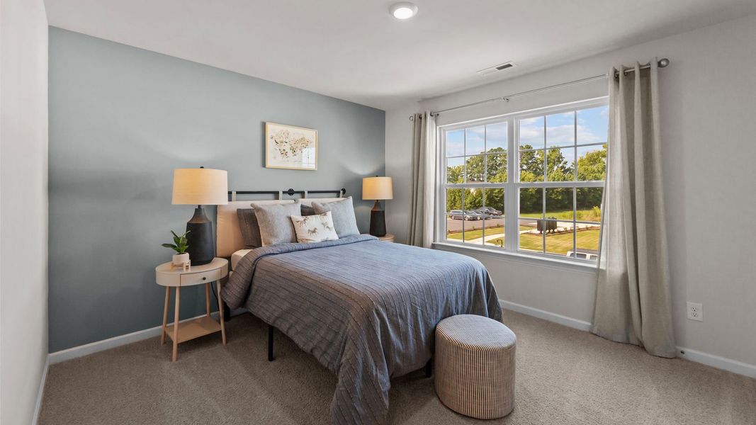 Furnished interior in a model home at Ridgewood Farms in Winterville (Image 30).