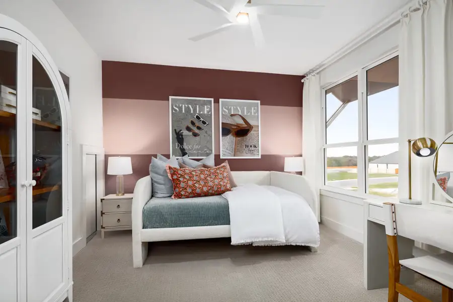 Furnished interior in a model home at 6 Creeks in Kyle (Image 32).