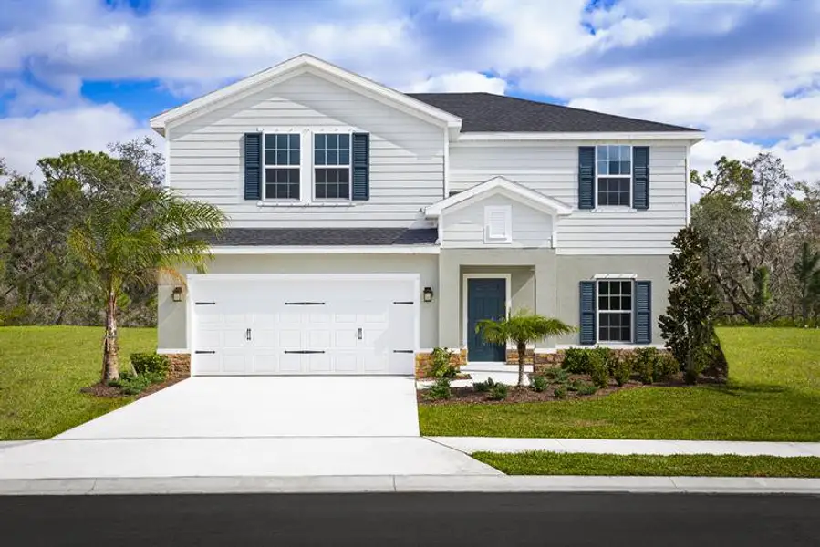 Front exterior of a home in the Terra Lago community, located in Indiantown, FL (Image 3).