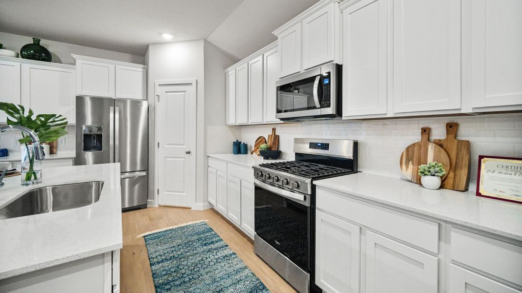 Furnished interior in a model home at Salem Crossing in Victoria (Image 4). Furnished interior in a model home at Salem Crossing in Victoria (Image 4).