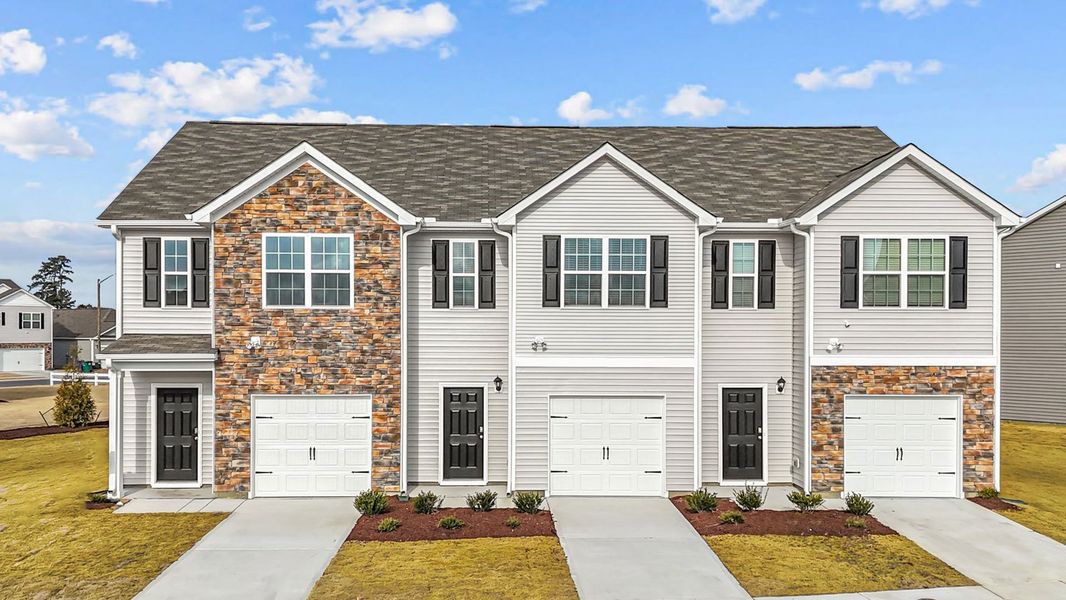 Front exterior of a home in the The Townes at Ridgewood Farms community, located in Winterville, NC (Image 13).