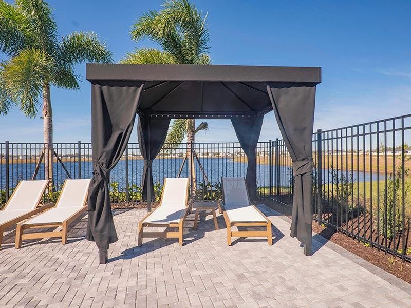 Unwind poolside in shaded or sunny lounges.
