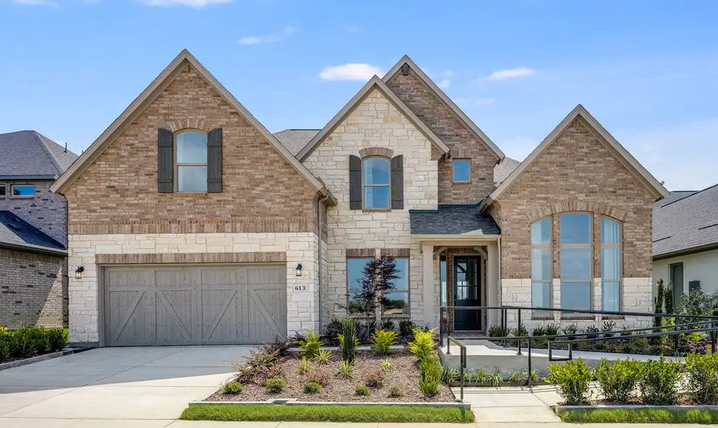 Front exterior of a home in the The Ranch at Uptown Celina 60s community, located in Celina, TX (Image 11).