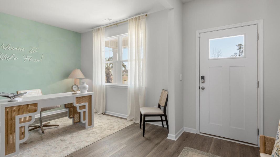 Furnished interior in a model home at The Grove at Blake Farm in Wilmington (Image 21). Furnished interior in a model home at The Grove at Blake Farm in Wilmington (Image 21).