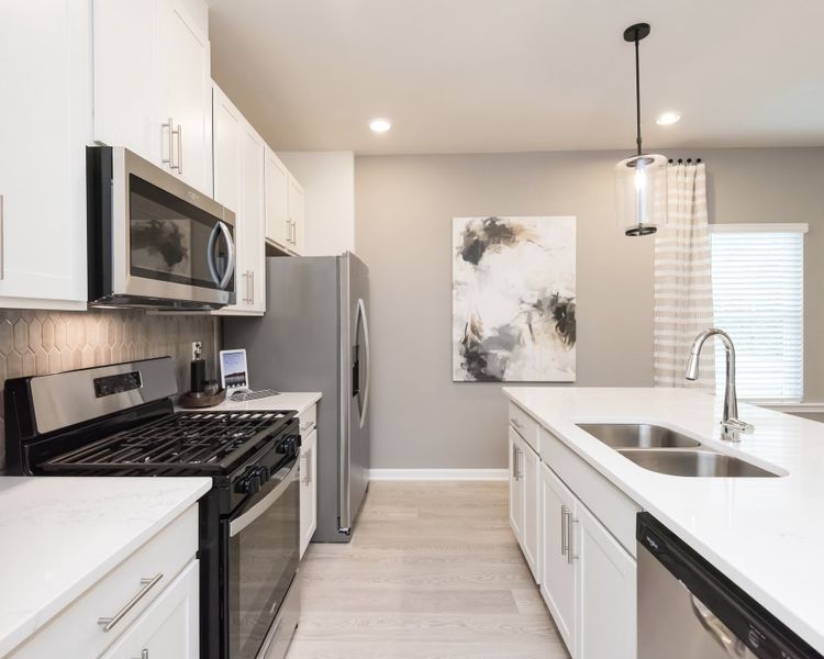 Prepare dinner or enjoy a casual lunch in your spacious kitchen.