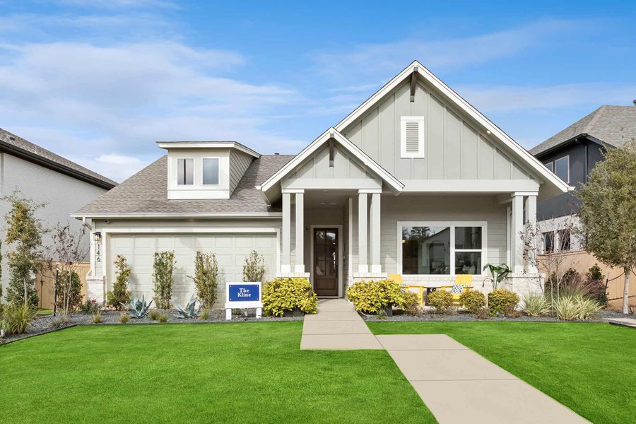 Front exterior of a home in the The Colony community, located in Bastrop, TX (Image 4).