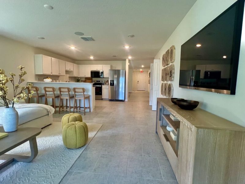 Furnished interior in a model home at Richmond Cove in Palm Bay (Image 31).