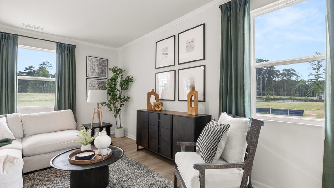 Furnished interior in a model home at Fairway 17 at Mirror Lake in Villa Rica (Image 25).