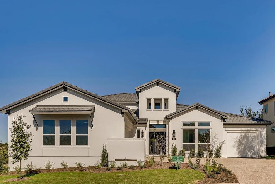 Front exterior of a home in the Andalucia At The Dominion community, located in Shavano Park, TX (Image 2).