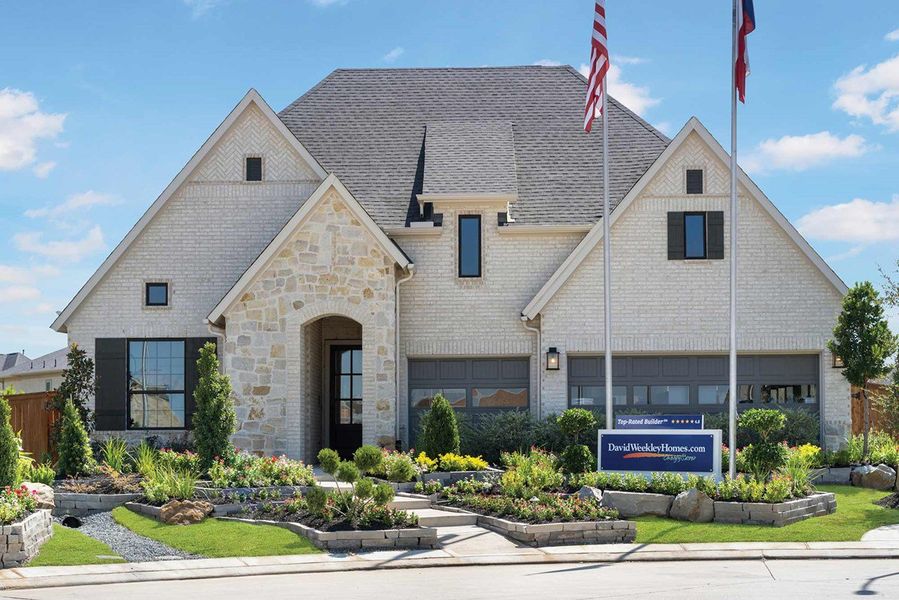 Front exterior of a home in the Cane Island - 60' Homesites community, located in Katy, TX (Image 9).