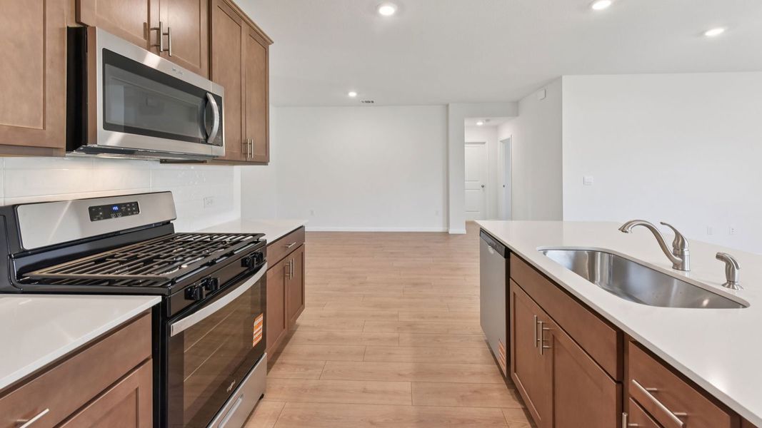 Furnished interior in a model home at Carillon in Manor (Image 8).