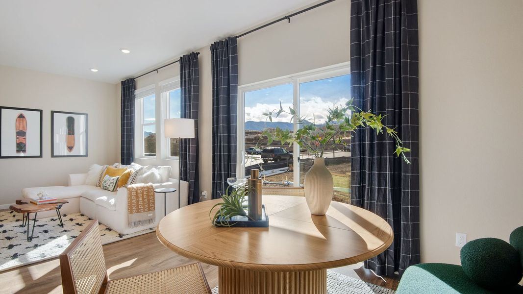 Furnished interior in a model home at Ellston Park in Colorado Springs (Image 3).