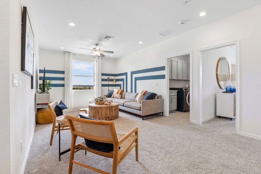 Furnished interior in a model home at The Sanctuary – Coastal Collection in Punta Gorda (Image 24).