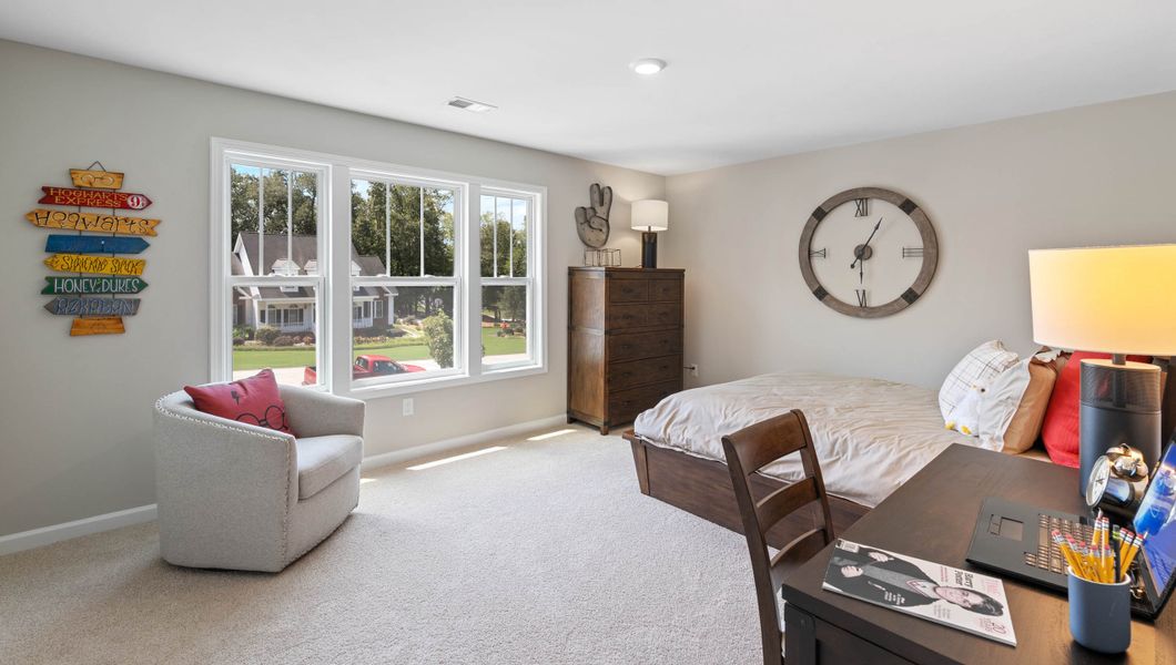 Furnished interior in a model home at Hunters Creek in Greenwood (Image 29).