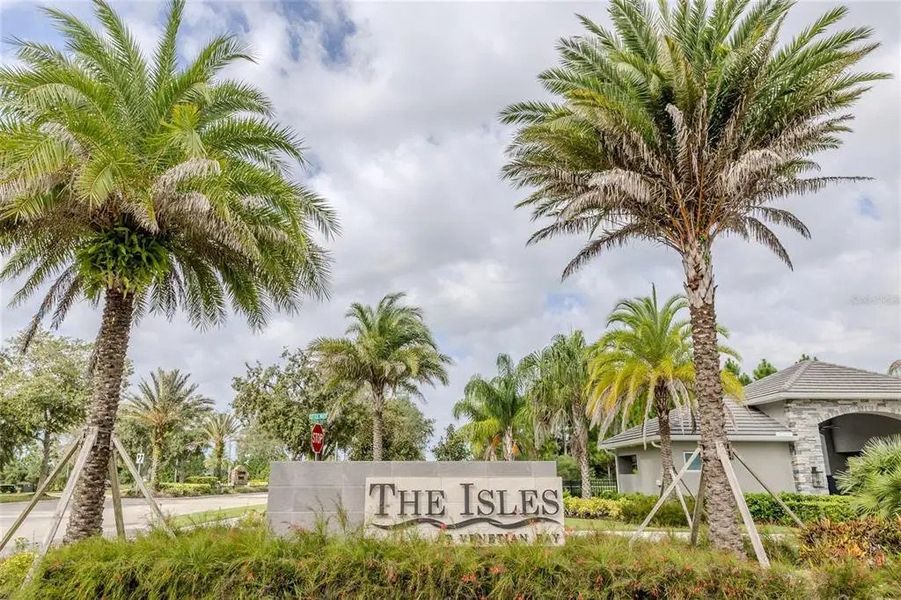 Main entrance to the Venetian Bay master-planned community in New Smyrna Beach, FL, featuring its landmark signage (Image 1). Main entrance to the Venetian Bay master-planned community in New Smyrna Beach, FL, featuring its landmark signage (Image 1).