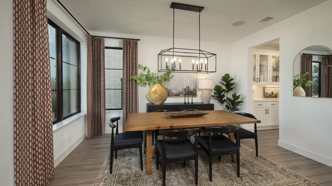 Furnished interior in a model home at Harvest Green 60' in Richmond (Image 5).