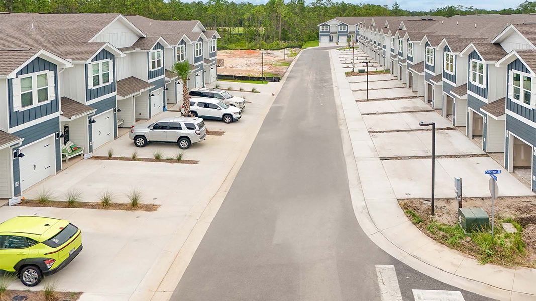 Front exterior of a home in the Hawks Landing Townhomes community, located in Santa Rosa Beach, FL (Image 8).