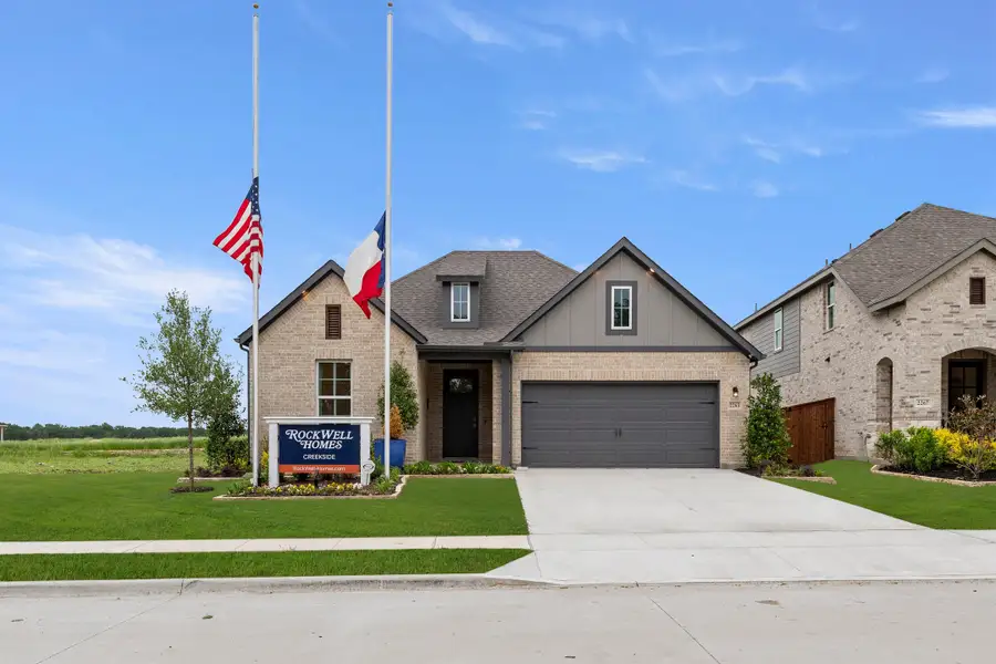 Front exterior of a home in the Creekside community, located in Royse City, TX (Image 4).