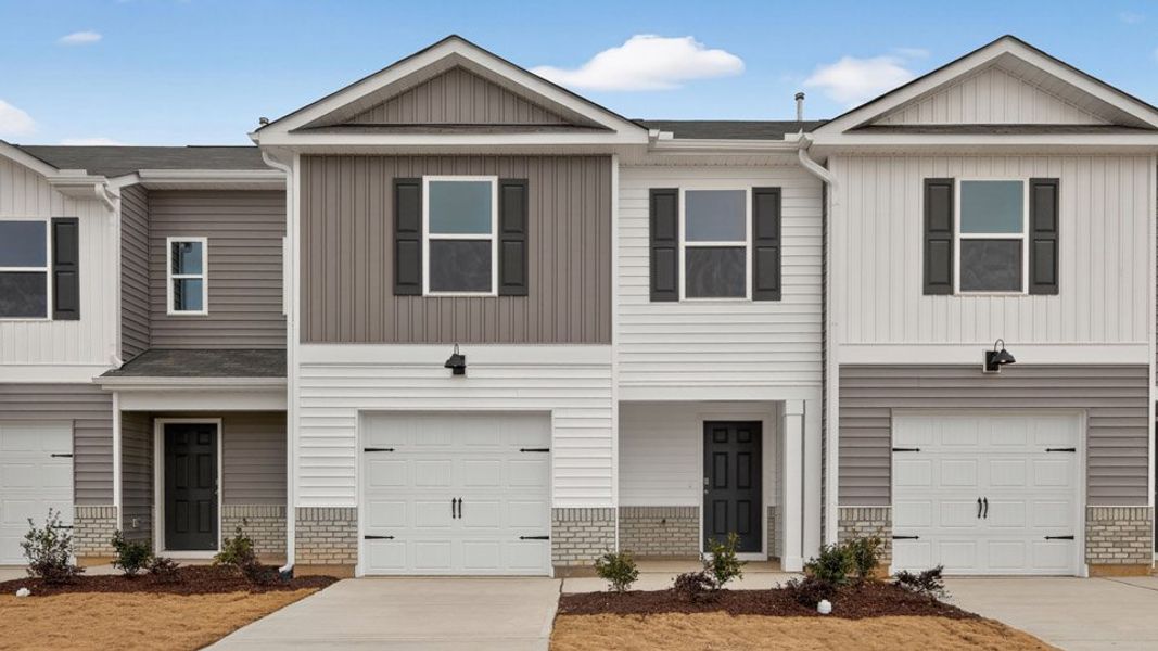 Front exterior of a home in the The Townes at Honeycutt Oaks community, located in Angier, NC (Image 11).
