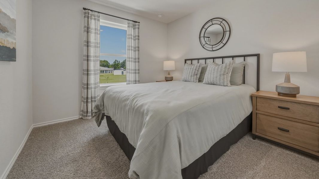 Furnished interior in a model home at Asher Oaks in Bonham (Image 26). Furnished interior in a model home at Asher Oaks in Bonham (Image 26).
