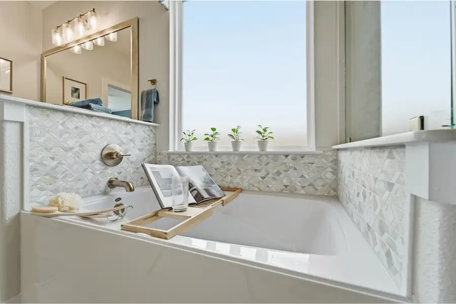 Furnished interior in a model home at Wildrye in Waller (Image 49).