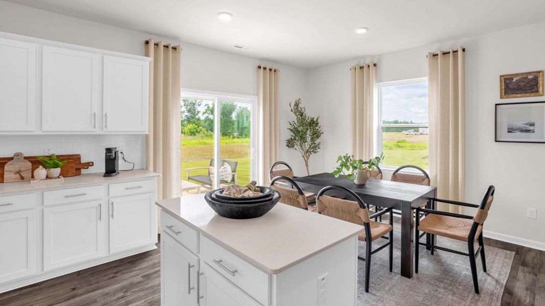 Furnished interior in a model home at Shahbain Reserve in Raeford (Image 13).
