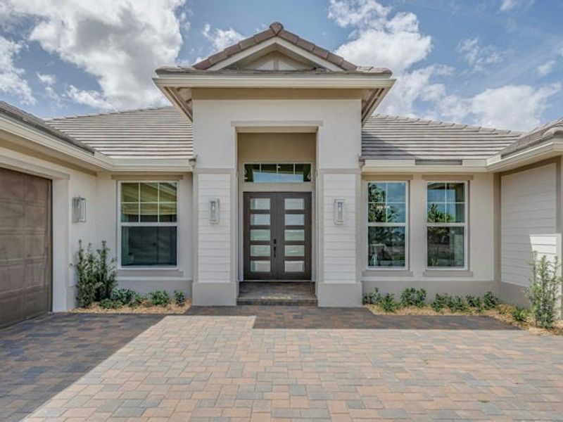 Front exterior of a home in the BELTERRA community, located in Port St. Lucie, FL (Image 68).