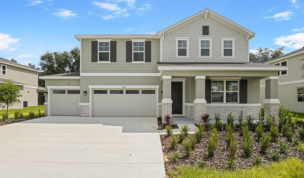 Front exterior of a home in the Seasons at Wekiva Ridge community, located in Mount Dora, FL (Image 2).