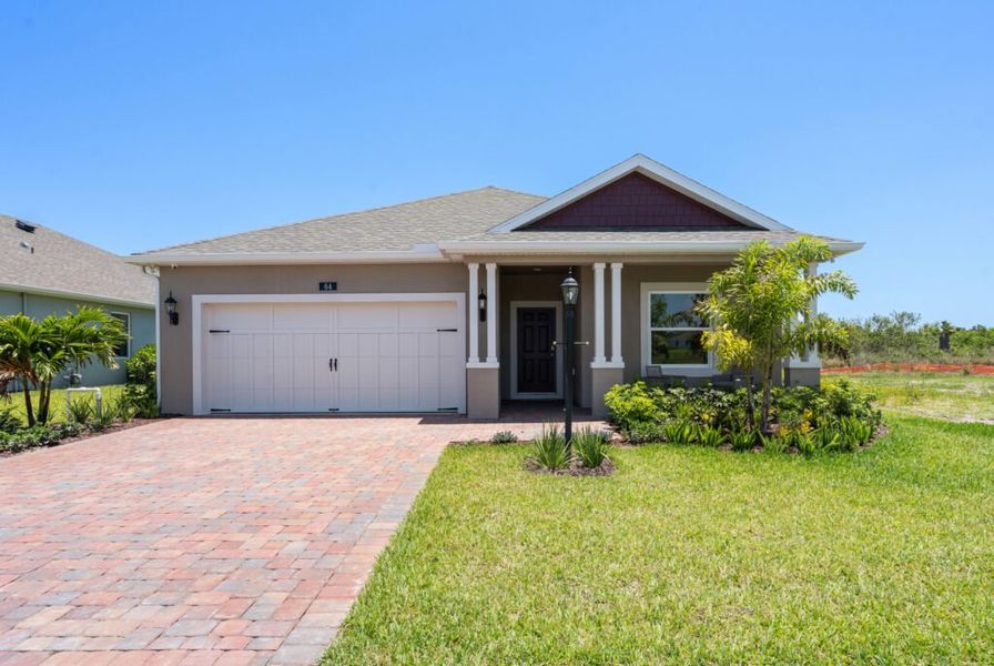 Front exterior of a home in the Spirit Of Sebastian community, located in Sebastian, FL (Image 2).