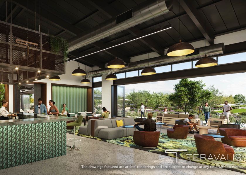 A group of people sitting at tables.