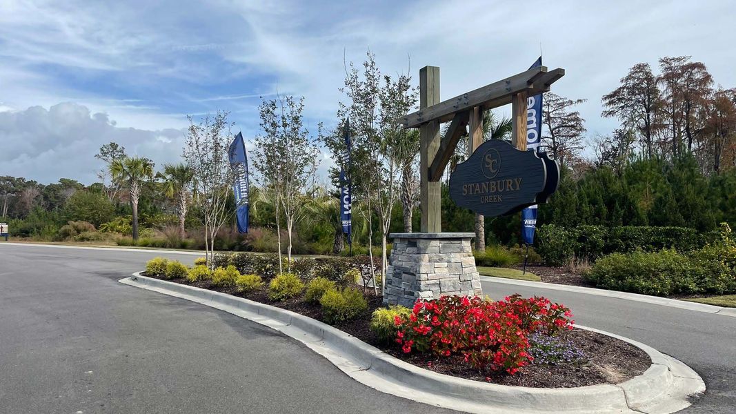 Entrance to the Stanbury Creek community in Supply, NC, featuring signage and landscaping (Image 1).