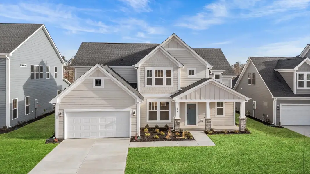 Front exterior of a home in the Woodland Summit community, located in Simpsonville, SC (Image 13).