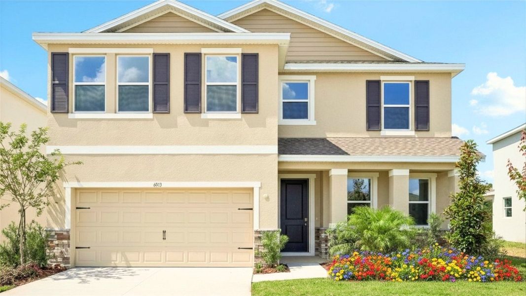 Front exterior of a home in the Deerbrook community, located in Land O' Lakes, FL (Image 5).