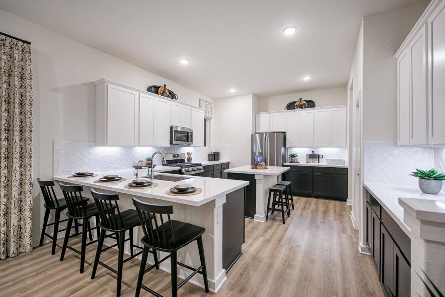 Furnished interior in a model home at Buffalo Crossing – New Phase Now Preselling in Cibolo (Image 7).